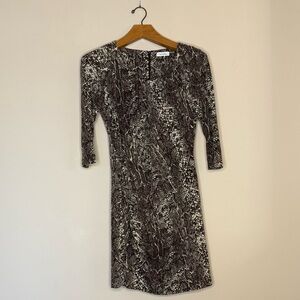 Calvin Klein dress in an olive green color with animal print pattern size 12